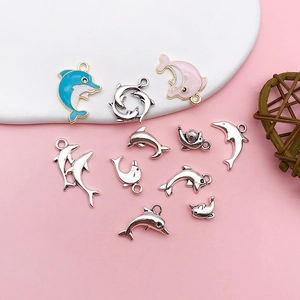 Selection of colorful dolphin charms and pendants for DIY jewelry and keychains