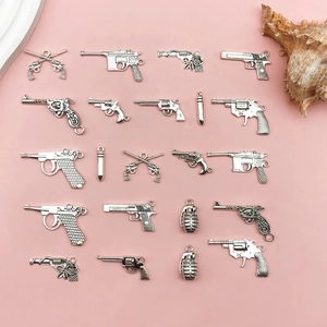 Collection of retro silver-tone alloy miniature gun and bullet charms for DIY jewelry