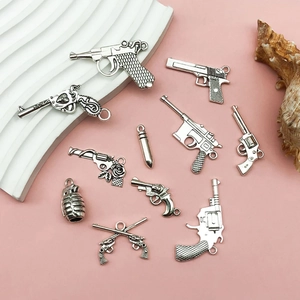 Vintage silver alloy gun and bullet pendants for DIY necklace and bracelet jewelry making