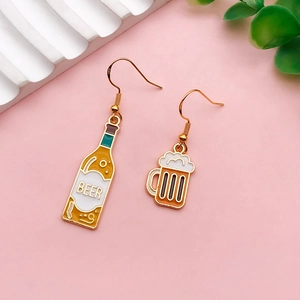 Macro detail of asymmetric beer bottle and glass earrings with S925 silver hooks
