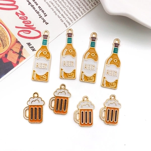 Creative acrylic beer bottle and mug earrings for Oktoberfest in a vibrant orange finish
