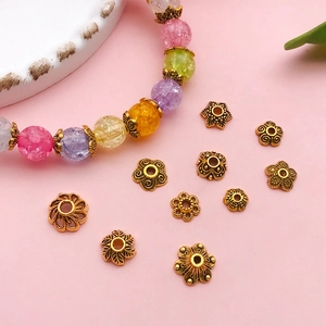 Calottes de perles fleurs évidées or antique pour bijoux DIY et accessoires cheveux