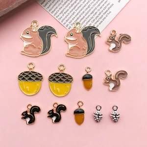 DIY squirrel and acorn alloy charms set in fall colors for jewelry and keychain making