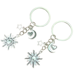 DIY silver metal keychain set with sun, moon, and star pendants for creative styling