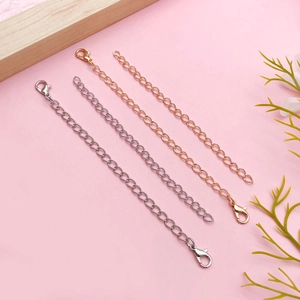 Detailed set of silver and rose gold extender chains with lobster clasps for jewelry DIY