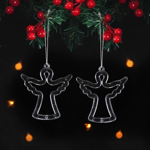 Close-up of clear acrylic angel ornaments with silver hanging strings for Christmas decor