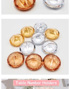 Macro detail of diamond cut crystal table number holders in assorted colors for weddings