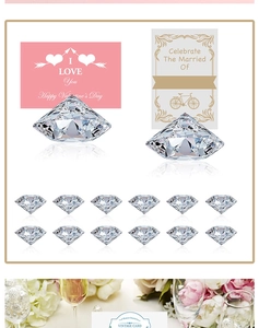 Macro shot of clear crystal diamond place card holders for wedding table setting and decor