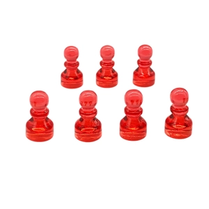 Set of seven transparent red crystal board game pieces for educational training and play