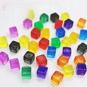 Close-up of colorful translucent acrylic cube pieces for board games and DIY projects