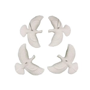 Set of four realistic white dove ornaments for wedding and festive event decorations