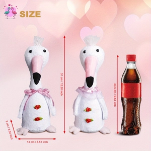 Size comparison of plush flamingo toy with 31cm height measurement and drink bottle