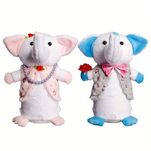 Close-up of elephant plush toy couple with heart decorations and LED light feature