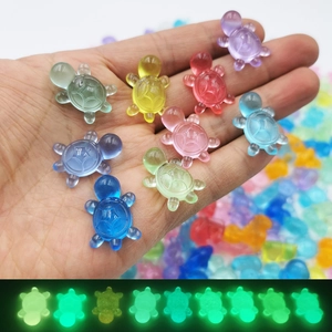 Glow-in-the-dark resin turtles in colorful macaron shades for car console decoration