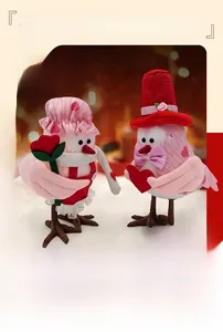 Close-up of Valentine birds with pink hats and hearts for holiday decoration