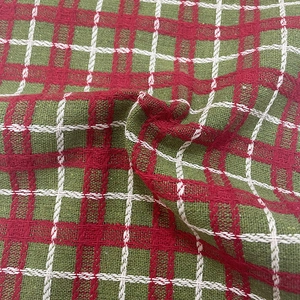 Red, green and white plaid knitted tartan fabric texture for Christmas tree skirts