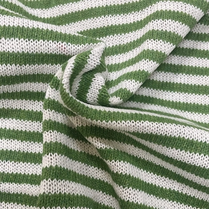 Soft green and white striped knit fabric for sweaters and Christmas decorations