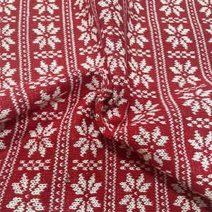 Christmas red and white snowflake jacquard knitted fabric for festive home pillows