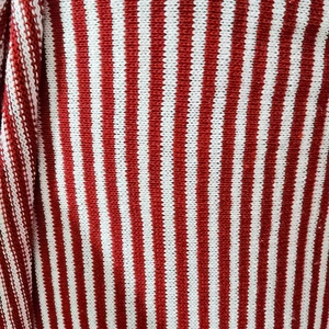 Christmas style red and white striped knit fabric with vertical ribbed texture for dolls