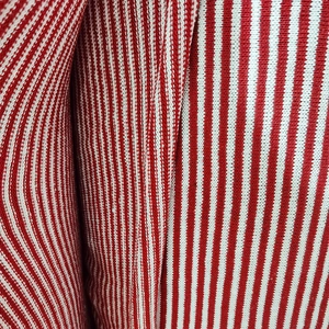 Vertical red and white striped knit fabric for Christmas crafts and festive toys