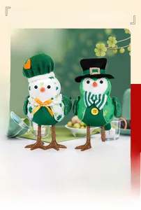Close-up of lighted St. Patrick's Day green bird plushies with hats and clover patterns