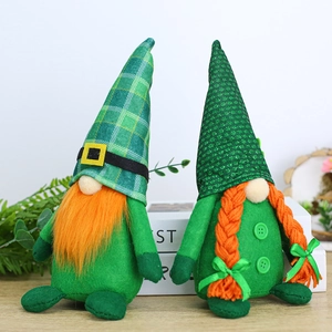 Pair of St. Patrick's Day green gnomes with orange beards and plaid hat decorations
