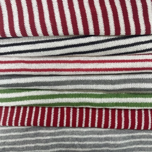 Various colorful striped knit fabrics with soft texture for Christmas and winter clothing