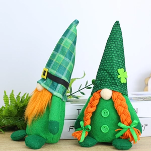 Detail of St. Patrick's Day gnomes with green hats, orange beards and clover sequins
