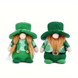 St. Patrick's Day gnome dolls set with clover patterns and golden braids on white backdrop