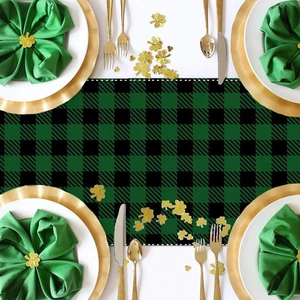Saint Patrick's Day green plaid table runner with lucky clover design on linen fabric