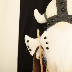 Handcrafted Viking Gnome plush featuring a horned felt helmet and a double-headed wooden axe