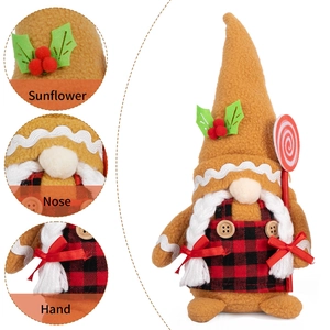 Gingerbread Christmas gnome plush with red plaid apron and candy cane on white background