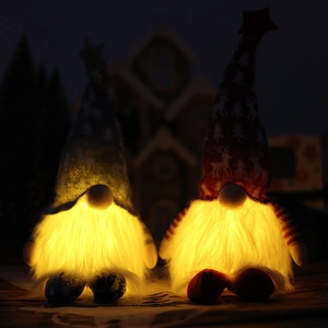 Lighted Christmas gnomes with glowing LED stars and knit hats for festive holiday decor