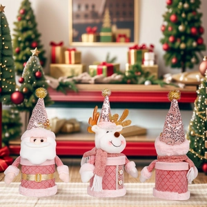 Pink Christmas gift boxes with Santa and Reindeer designs and glittery sequin hats