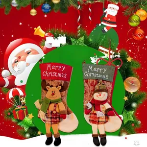 Detail of 3D reindeer and snowman Christmas stockings with Scottish plaid and wood grain textures
