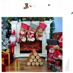 Detailed view of 3D Christmas stockings featuring Santa, Snowman and Reindeer characters