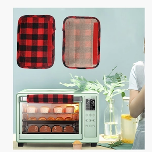 Detail of red and black plaid refrigerator handle covers with velcro fasteners
