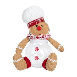 Detailed close-up of a gingerbread man Christmas candy jar with textured corduroy fabric