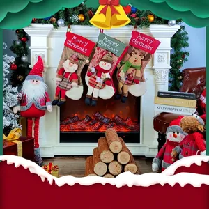 Three large Christmas stockings with Santa, Snowman, and Reindeer set against a fireplace
