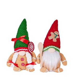 Pair of festive Christmas gnomes with knit hats, gingerbread decor and plush white beards