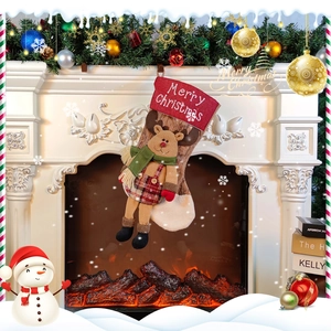 3D reindeer Christmas stocking hanging on fireplace mantel for holiday gift decorations