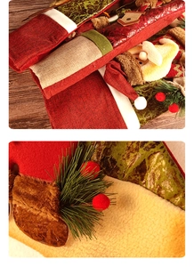 Detail of Christmas stocking with 3D Santa doll, pine needles and berries decor