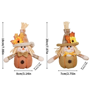 Fall harvest scarecrow gnome dolls with pumpkin base and autumn maple leaf decorations