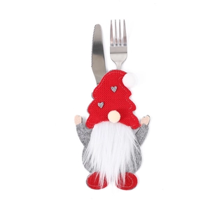 Christmas Gnome cutlery holder with red knit hat and white beard for festive table decor