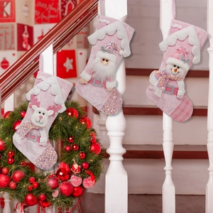Pink sequin Christmas stockings with 3D Santa, Snowman and Reindeer on stairs