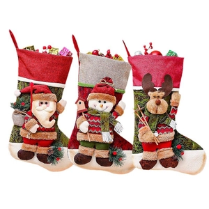 Three-piece Christmas stocking set featuring 3D Santa, Snowman and Reindeer characters