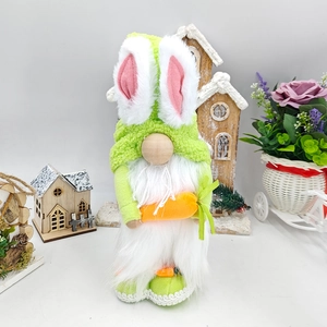 Detail of Easter gnome plush with green hat, bunny ears, and carrot in a cozy decor set