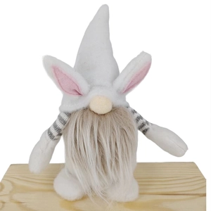 Detail of Easter gnome plush with pink bunny ears and striped sleeves on wooden base
