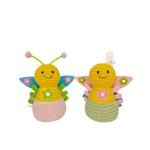 Handmade knitted bee plush toys set with textured corn grain pattern on white background