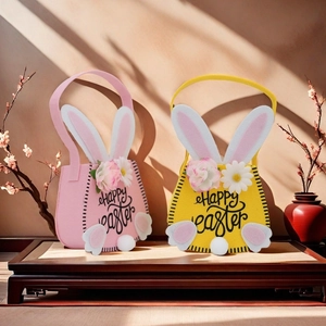 Felt Easter bunny gift baskets in pink and yellow with Happy Easter script decoration